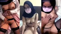 Jilbab Bergaya Dengan Kacamata Dan Masker Yang Menggoda